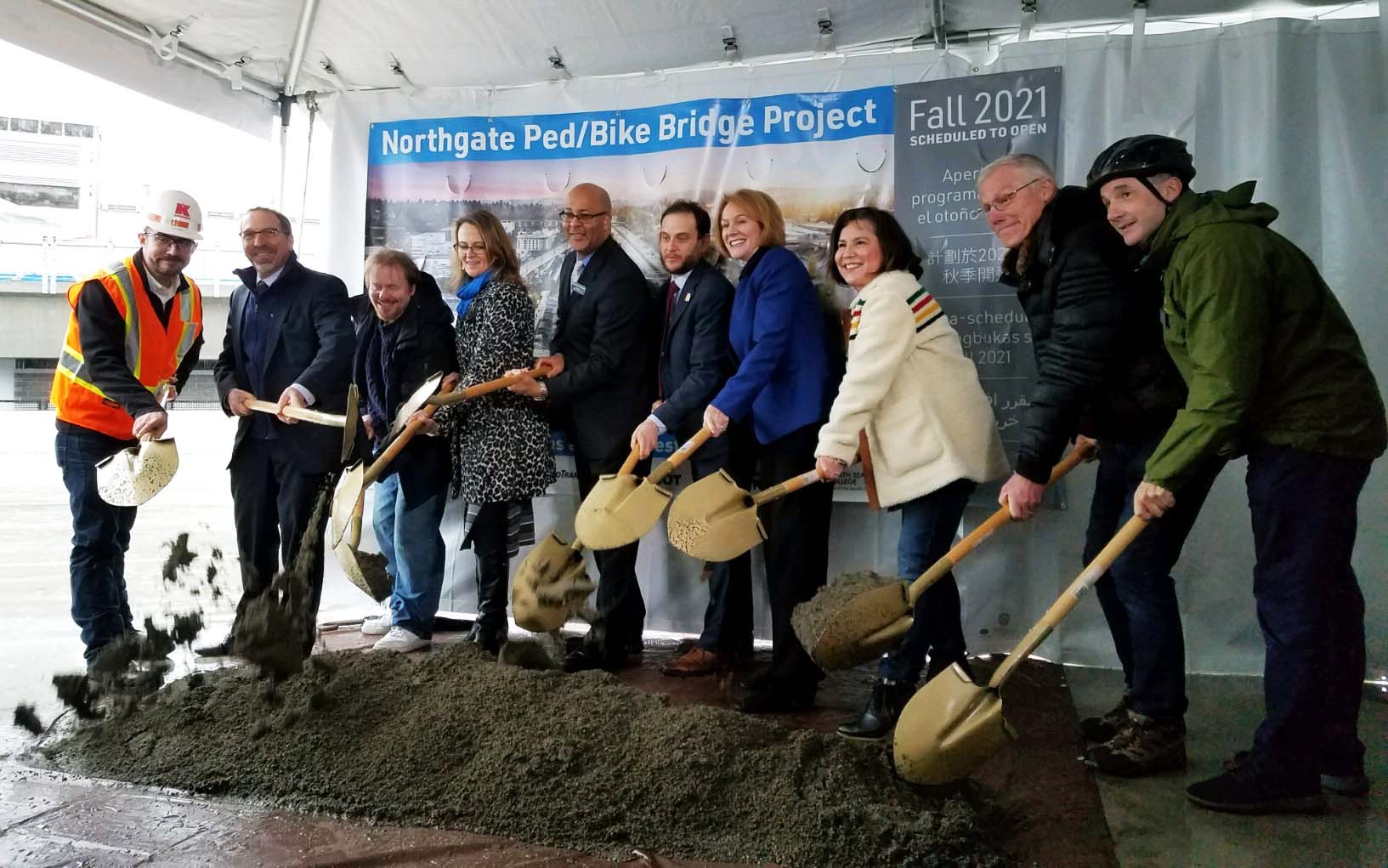 North Seattle College President Dr. Warren Brown joined Seattle Mayor Jenny Durkan, Councilmember Debora Juarez, and other transit officials to celebrate the start of construction on the Northgate Pedestrian and Bicycle Bridge.