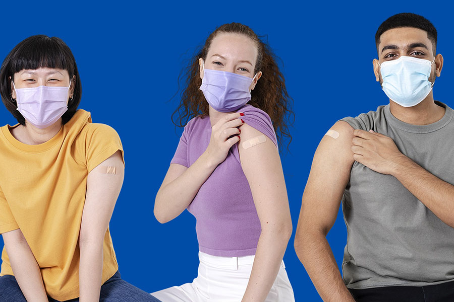 females and males wearing blue face masks