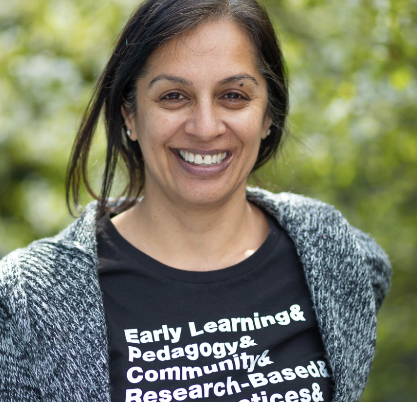 female with black hair wearing a black shirt