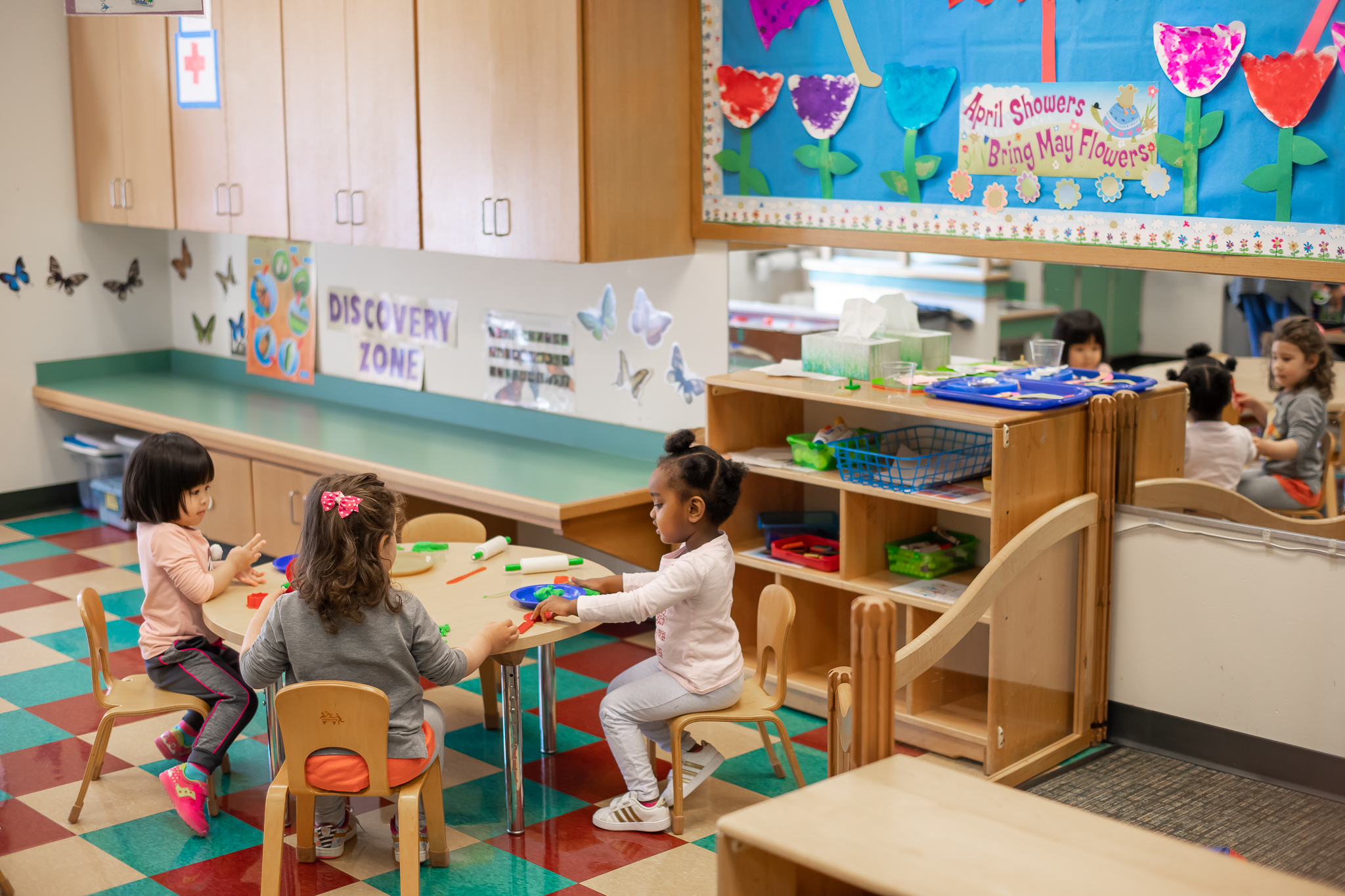 children playing at a table