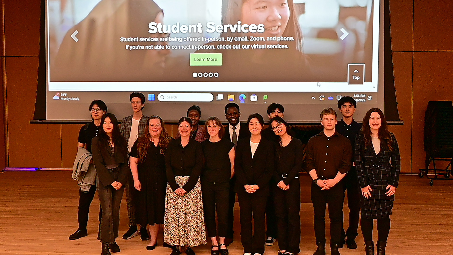 students standing on a stage 