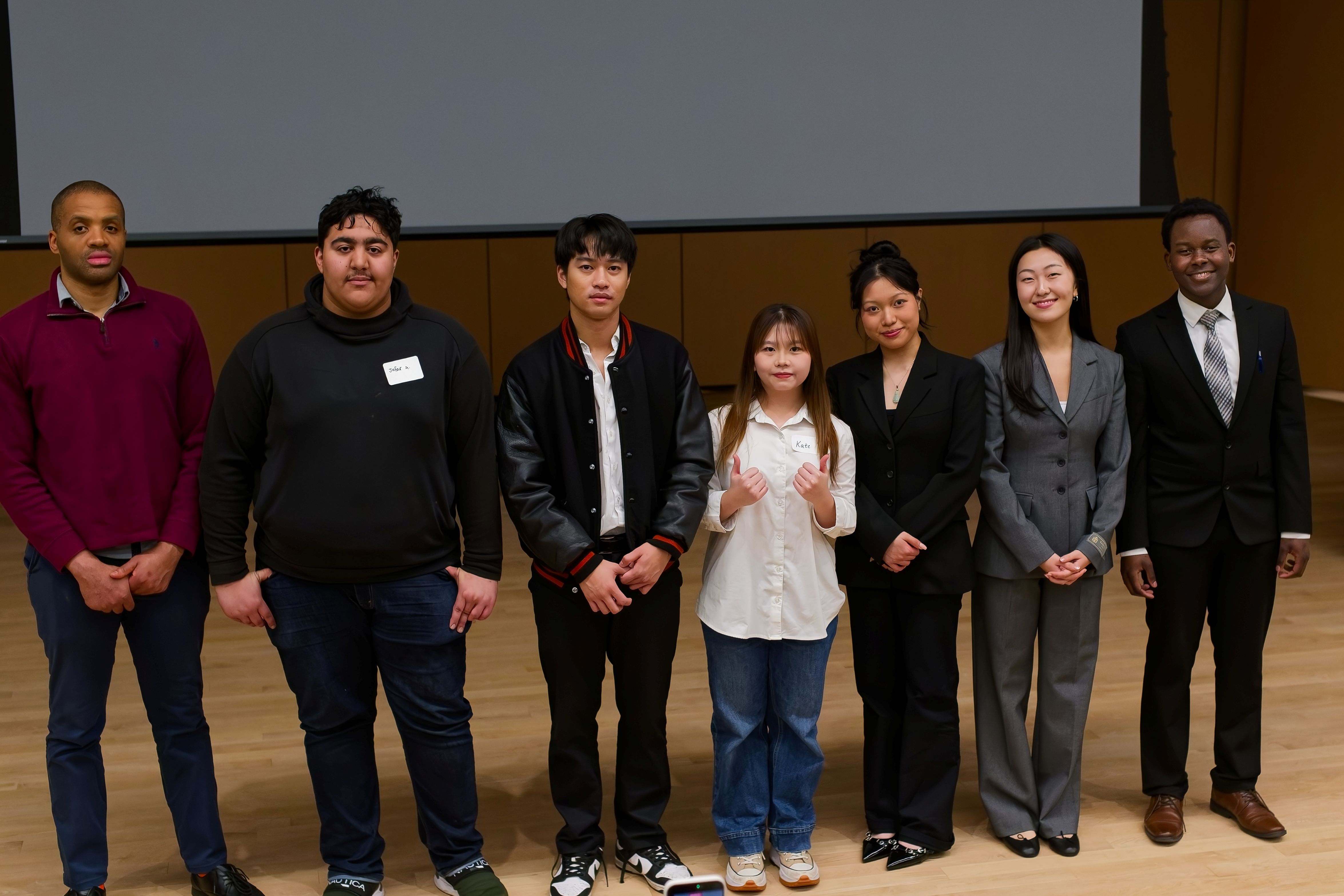 students standing on a stage